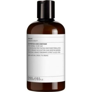 Braune Conditioner-Flasche mit weißem Etikett und schwarzem Verschluss.