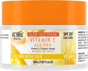 Gesichtscreme mit Vitamin C, weiß-orange Verpackung, SPF 20, für stumpfe Haut.