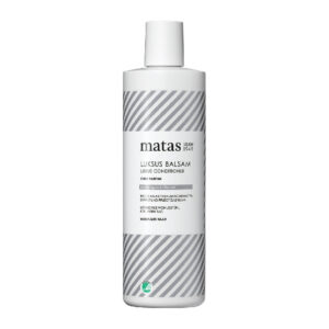 Weiße Flasche mit grauen Streifen und Matas Luxus Conditioner Aufschrift.
