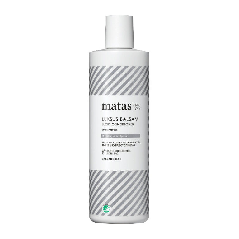 Weiße Flasche mit grauen Streifen und Matas Luxus Conditioner Aufschrift. Weiße Flasche mit grauen Streifen und Matas Luxus Conditioner Aufschrift.