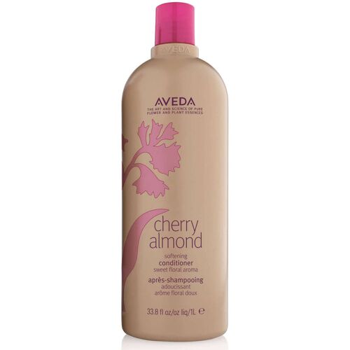 Braune Flasche mit pinkem Aufdruck, große Flasche Haarspülung von Aveda. Braune Flasche mit pinkem Aufdruck, große Flasche Haarspülung von Aveda.