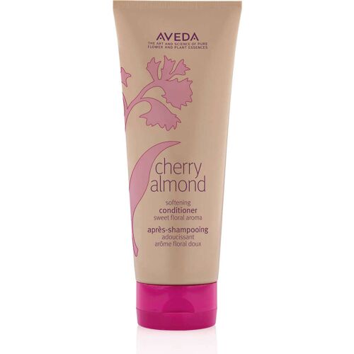 Beige Tube Aveda-Conditioner mit pinken Akzenten, Aufschrift „Cherry Almond“. Beige Tube Aveda-Conditioner mit pinken Akzenten, Aufschrift