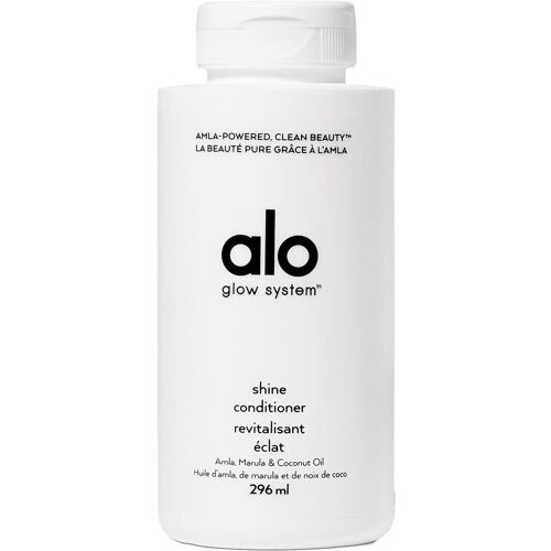 Weiße Flasche mit schwarzem Text von Alo Glow System Conditioner.