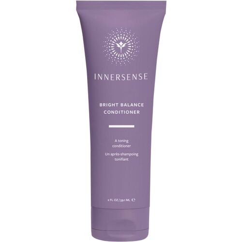 Lila Conditionerflasche mit Innersense-Logo und Beschriftung 