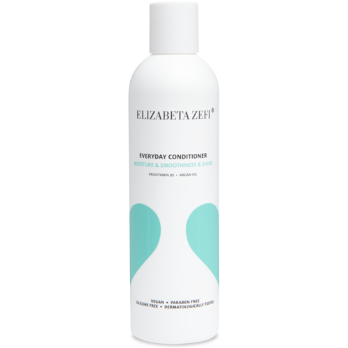 Weiße Flasche eines Conditioners mit blauer und schwarzer Schrift.