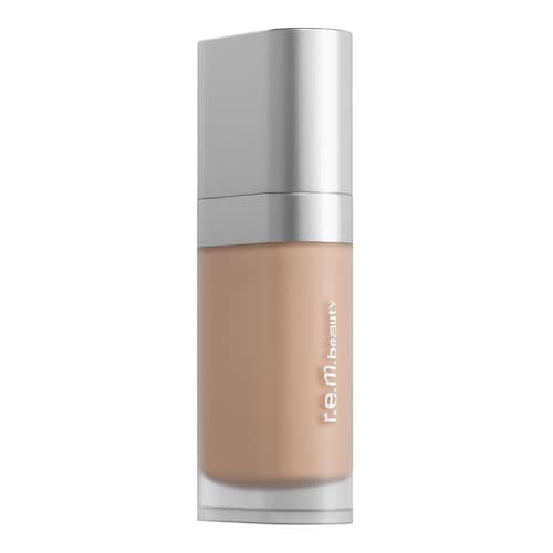 Flasche mit r.e.m.beauty Foundation mit silbernem Deckel.
