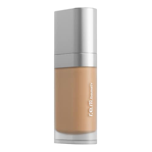 Kosmetikflasche mit hellem Beige-Ton und silbernem Verschluss. Kosmetikflasche mit hellem Beige-Ton und silbernem Verschluss.