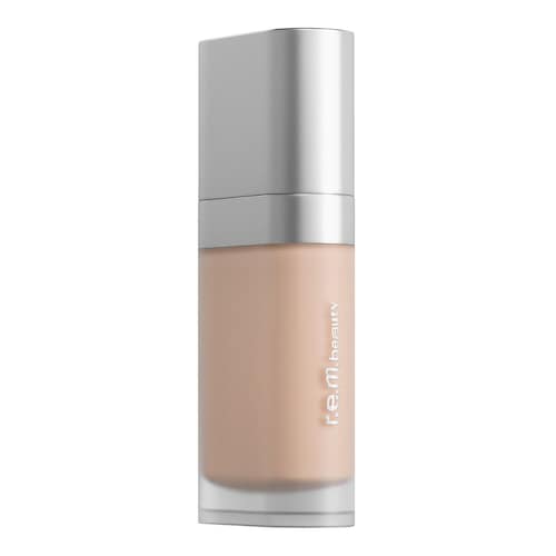 Flüssige Foundation in transparentem Spender mit silbernem Verschluss und r.e.m. beauty Branding. Flüssige Foundation in transparentem Spender mit silbernem Verschluss und r.e.m. beauty Branding.