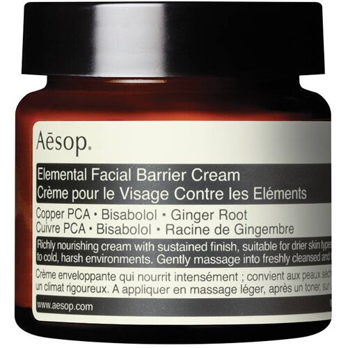 Braunes Glasgefäß mit Aesop Elemental Facial Barrier Cream Etikett.