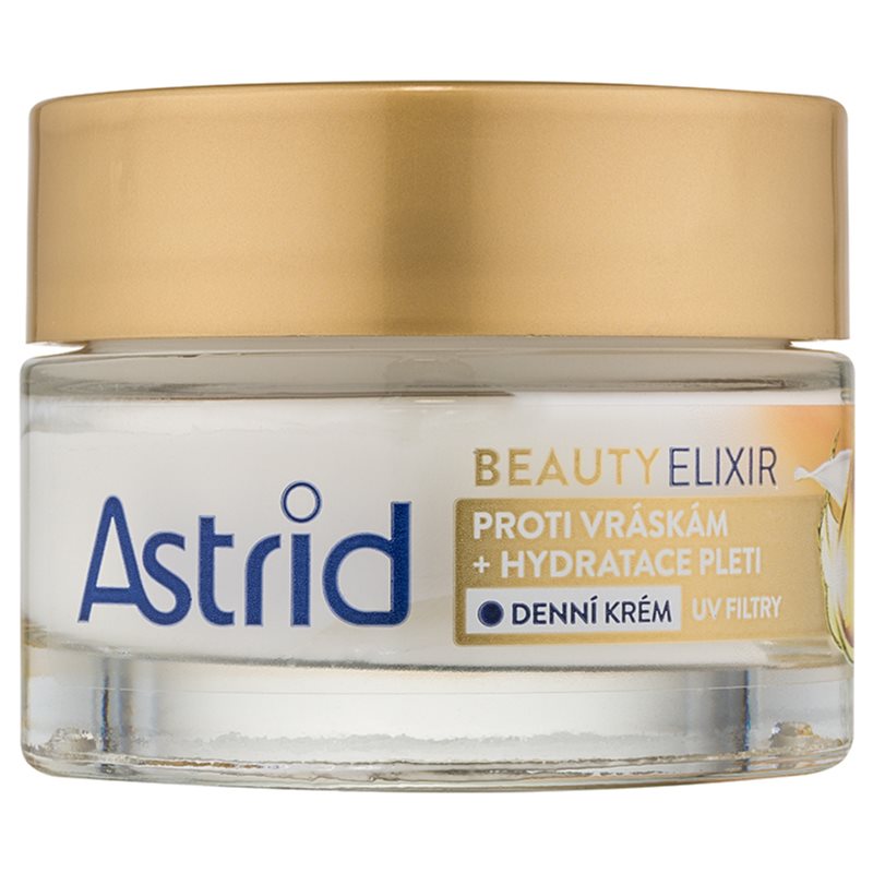 Glasbehälter mit goldfarbenem Deckel, Aufschrift "Astrid Beauty Elixir", Anti-Aging-Creme.
