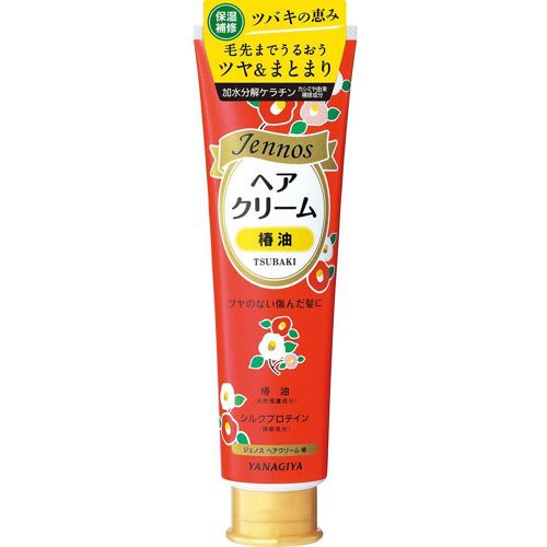Rote Haarcreme-Tube mit japanischer Beschriftung und Tsubaki-Design. Rote Haarcreme-Tube mit japanischer Beschriftung und Tsubaki-Design.