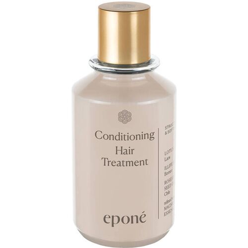 Beige Haarpflegeflasche mit goldenem Verschluss und schwarzer Schrift.