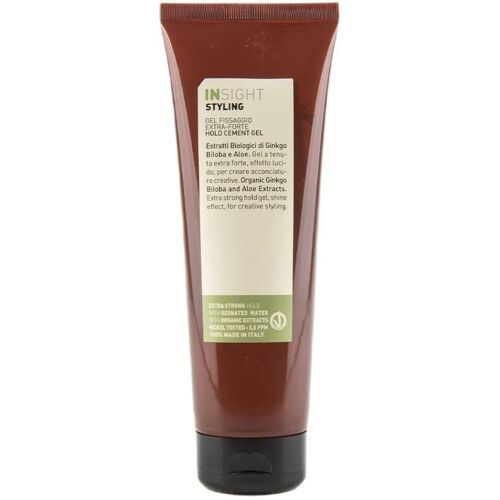 Braune Haarstyling-Gel-Tube mit Etikett und schwarzem Verschluss, Markenname sichtbar. Braune Haarstyling-Gel-Tube mit Etikett und schwarzem Verschluss, Markenname sichtbar.