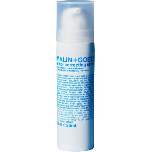 Eine Kunststoffflasche mit blauem Text, die ein Retinol Korrekturserum enthält.