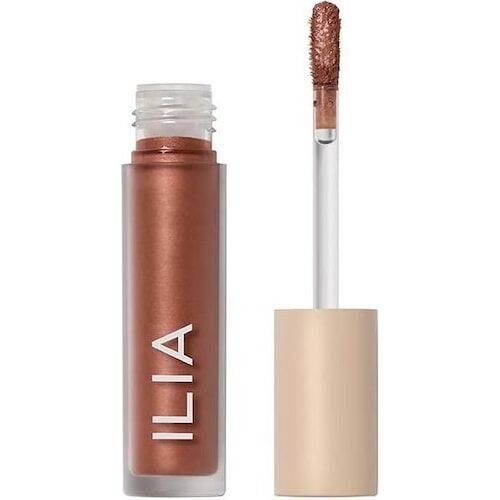 Geöffneter Lipgloss mit bronzefarbenem Inhalt und beige Applikatorkappe. Geöffneter Lipgloss mit bronzefarbenem Inhalt und beige Applikatorkappe.