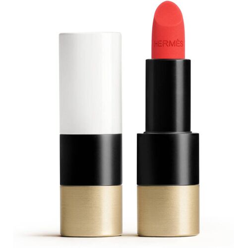 Ein roter Lippenstift in einer eleganten schwarzen und goldenen Hülle. Ein roter Lippenstift in einer eleganten schwarzen und goldenen Hülle.