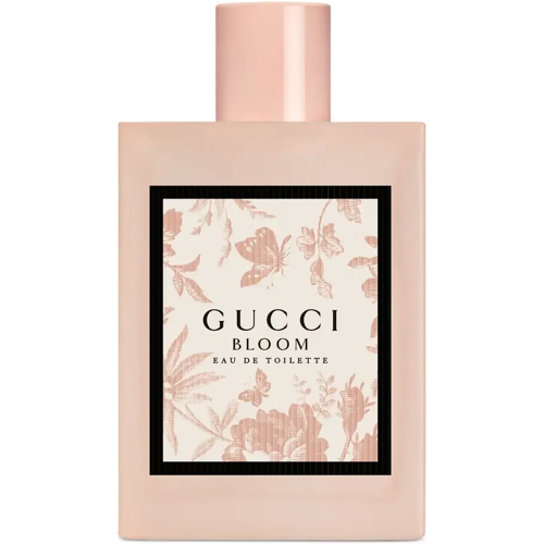 Rosa Parfümflasche Gucci Bloom mit floralem Etikett in rechteckiger Form.