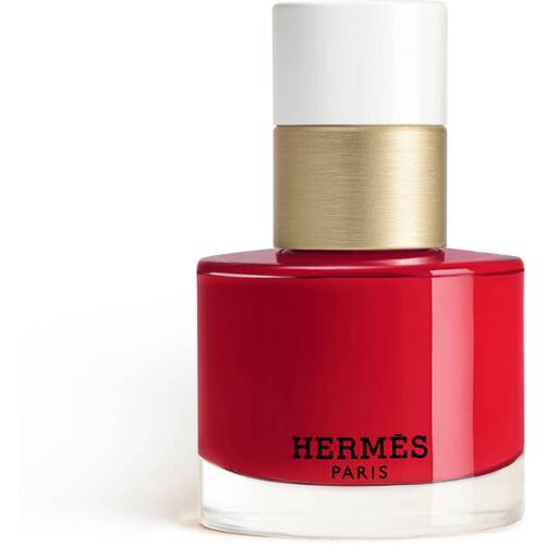 Rote Hermès Parfümflasche mit weißem und goldenem Verschluss. Rote Hermès Parfümflasche mit weißem und goldenem Verschluss.
