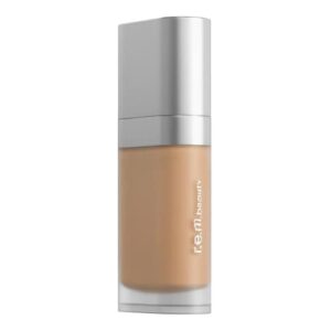 Kosmetikflasche mit hellem Beige-Ton und silbernem Verschluss.