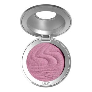 Offene silberne Lidschattendose mit rosa Puderschatten und r.e.m.-Logo.