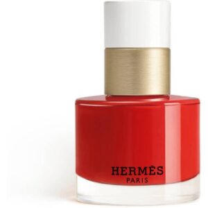 Rote Hermès-Parfümflasche mit weißem und goldfarbenem Verschluss.