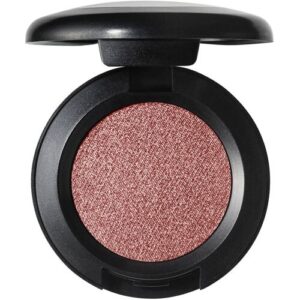 Runde Lidschatten-Dose mit offenem Deckel und schimmerndem rosa Inhalt.