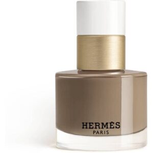 Luxus-Parfümflasche von Hermès in elegantem, modernem Design mit goldenem Akzent.