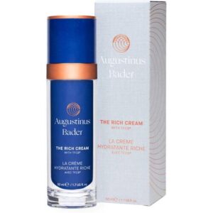 Blaue Cremeflasche mit Verpackung von Augustinus Bader