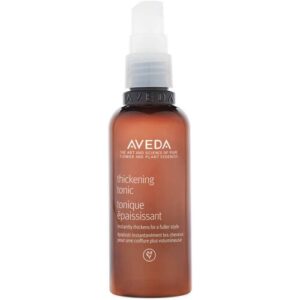 Braune Sprühflasche von Aveda mit Beschriftung für Haartonikum.