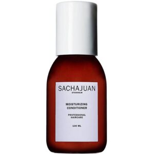 Braune Flasche mit weißem Etikett und Aufschrift "Sachajuan Moisturizing Conditioner".