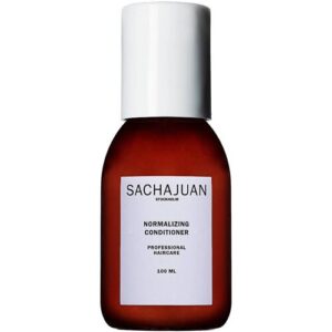 Braune Conditioner-Flasche mit weißem Etikett, Marke Sachajuan, 100 ml.