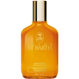 Orangefarbene Flasche mit goldener Kappe und Aufschrift Ligne St Barth.