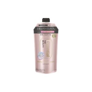 Rosa Shampooflasche mit schwarzem Verschluss und japanischer Beschriftung.