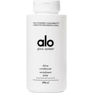 Weiße Flasche mit schwarzem Text von Alo Glow System Conditioner.