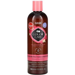 Braune Flasche Haarkonditionierer Hask Color Care mit rosa Deckel und Etiketten.