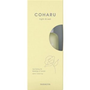 Hellgelbe Verpackung eines Haarstylingöls von COHARU mit Blumenemblem.