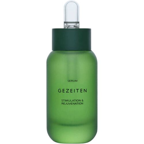 Grüne Flasche eines Serums mit schwarzem Verschluss und Tropfer. Grüne Flasche eines Serums mit schwarzem Verschluss und Tropfer.