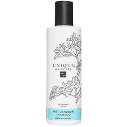 Weiße Shampooflasche mit schwarzem Verschluss und botanischem Design.