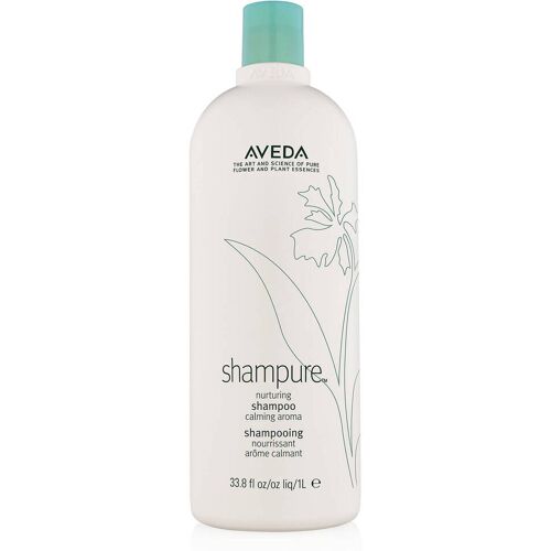 Weiße Shampoo-Flasche mit blauer Kappe und Pflanzenillustration.