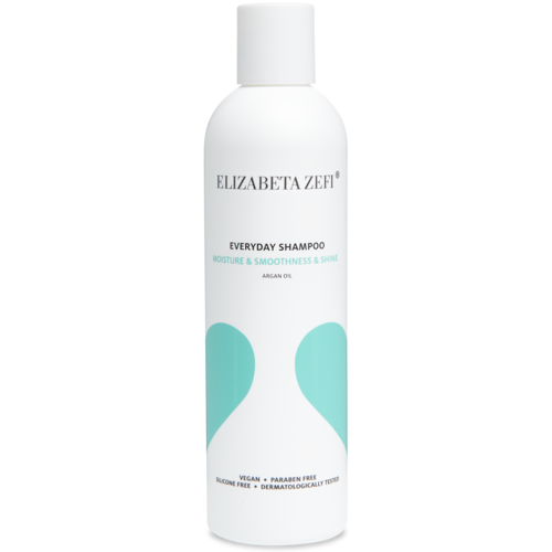 Weiße Shampooflasche mit türkisen Akzenten und Produktinformationen.