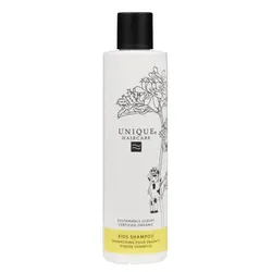 Weiße Shampooflasche mit schwarzem Deckel und botanischem Design.
