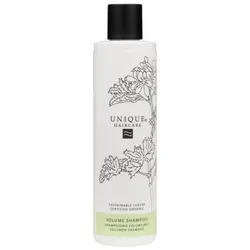 Weiße Shampooflasche mit schwarzem Deckel und floraler Gestaltung.